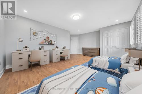 Front room staged with 2 queen beds & study desks - 6062 Prairie Circle, Mississauga, ON - Indoor Photo Showing Bedroom