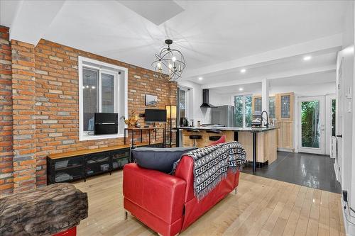 Living room - 201  - 203 Rue De La Montagne, Montréal (Le Sud-Ouest), QC - Indoor Photo Showing Living Room With Fireplace