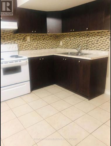Bsmt - 5623 Whitehorn Avenue, Mississauga, ON - Indoor Photo Showing Kitchen With Double Sink