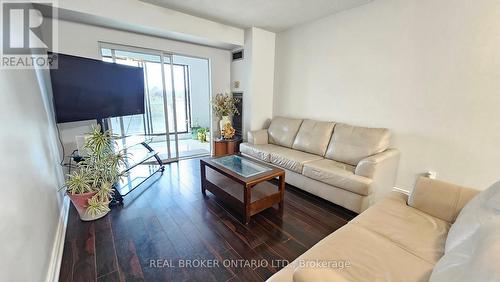 414 - 39 Kimbercroft Court, Toronto, ON - Indoor Photo Showing Living Room