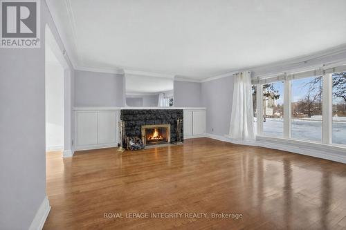 230 Smyth Road, Ottawa, ON - Indoor Photo Showing Living Room With Fireplace