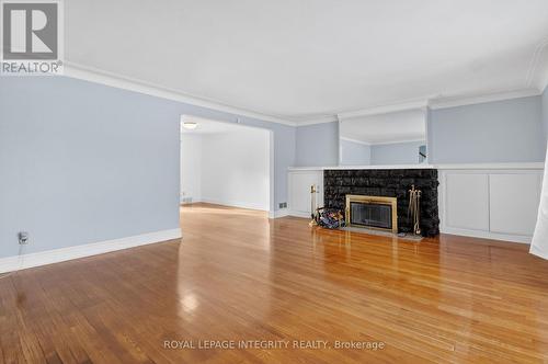 230 Smyth Road, Ottawa, ON - Indoor Photo Showing Living Room With Fireplace