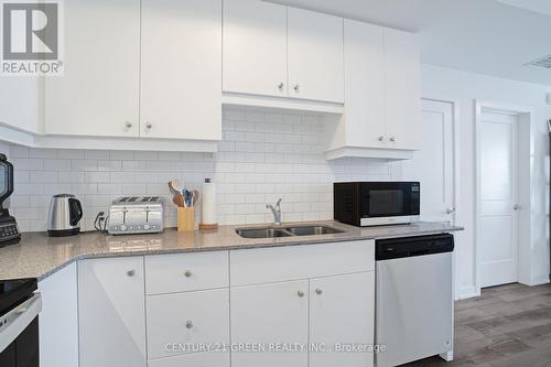 407 - 255 Northfield Drive E, Waterloo, ON - Indoor Photo Showing Kitchen With Double Sink