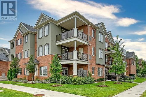 204 - 276 Gatwick Drive, Oakville (Ro River Oaks), ON - Outdoor With Facade