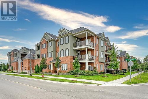 204 - 276 Gatwick Drive, Oakville (Ro River Oaks), ON - Outdoor With Facade