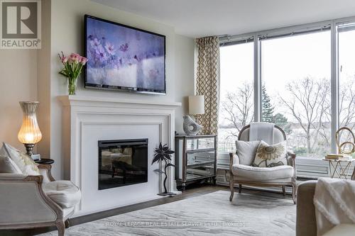 309 - 1 Palace Pier Court, Toronto, ON - Indoor Photo Showing Living Room With Fireplace