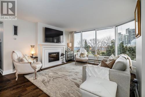 309 - 1 Palace Pier Court, Toronto, ON - Indoor Photo Showing Living Room With Fireplace
