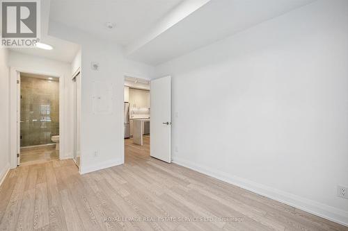 Primary Bedroom Boasts a Spa-Inspired 3-PC Ensuite - 223 - 3250 Carding Mill Trail, Oakville, ON - Indoor Photo Showing Other Room