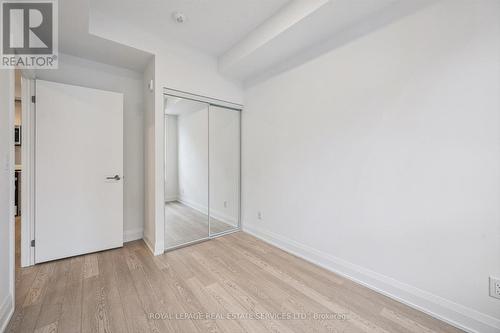 Generous Second Bedroom with Laminate Flooring - 223 - 3250 Carding Mill Trail, Oakville, ON - Indoor Photo Showing Other Room