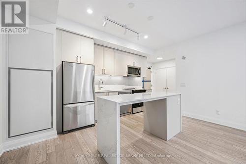 Enjoy Premium Whirlpool Stainless Steel Appliances - 223 - 3250 Carding Mill Trail, Oakville, ON - Indoor Photo Showing Kitchen With Stainless Steel Kitchen
