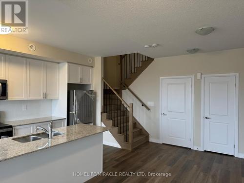 416 - 1577 Rose Way, Milton, ON - Indoor Photo Showing Kitchen With Double Sink