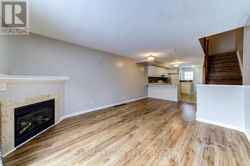 7 Royalton Lane, Collingwood, ON - Indoor Photo Showing Other Room With Fireplace