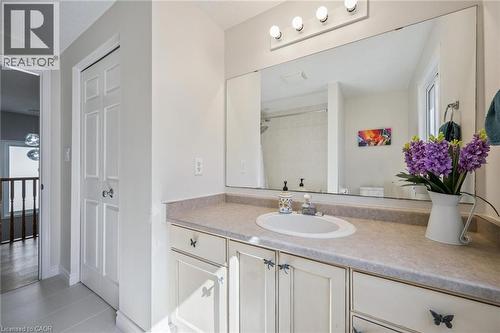 Bathroom with vanity, light tile patterned flooring, and a shower - 723 Black Cherry Street, Waterloo, ON - Indoor Photo Showing Bathroom