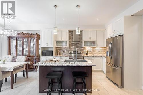 12 Hutton Crescent, Essa, ON - Indoor Photo Showing Kitchen With Upgraded Kitchen