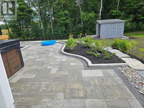 Summer photos to showcase interlock + landscaping - 1685 Trizisky Street, North Dundas, ON - Outdoor