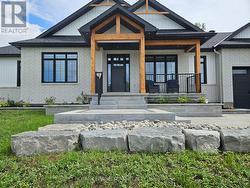 Summer photos to showcase interlock + landscaping - 