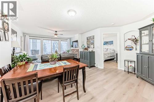107, 345 Rocky Vista Park Nw, Calgary, AB - Indoor Photo Showing Dining Room