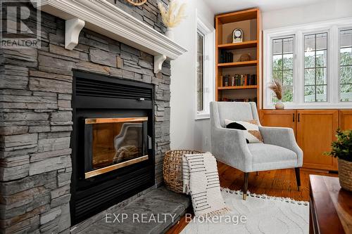 994359 Mono-Adjala Townline, Adjala-Tosorontio, ON - Indoor Photo Showing Living Room With Fireplace