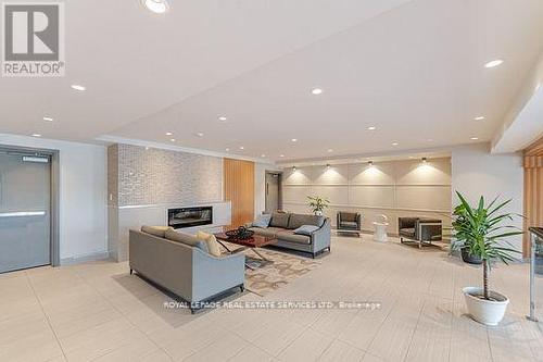 310 - 3028 Creekshore Common, Oakville, ON - Indoor With Fireplace