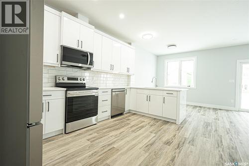 521 Sharma Crescent, Saskatoon, SK - Indoor Photo Showing Kitchen With Upgraded Kitchen