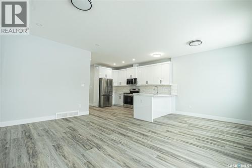 521 Sharma Crescent, Saskatoon, SK - Indoor Photo Showing Kitchen