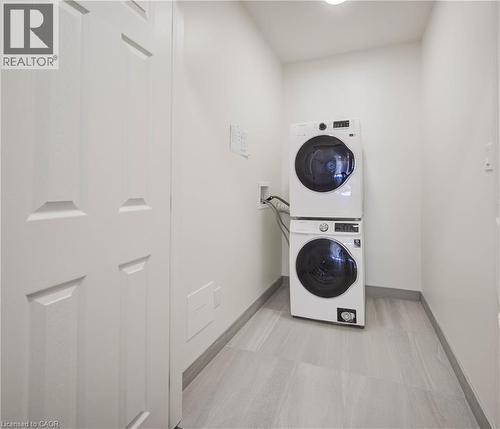 Laundry closet in suite. - 28 Main Street Unit# 8, Cambridge, ON - Indoor Photo Showing Laundry Room