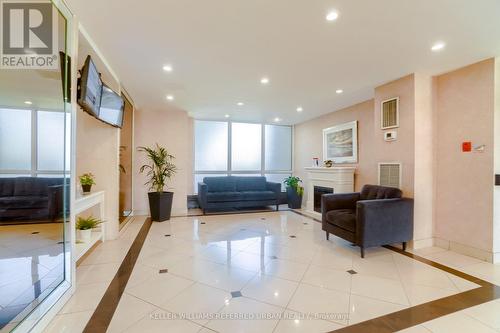 404 - 1515 Lakeshore Road E, Mississauga, ON - Indoor Photo Showing Other Room With Fireplace