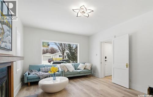 1709 E Avenue N, Saskatoon, SK - Indoor Photo Showing Living Room With Fireplace