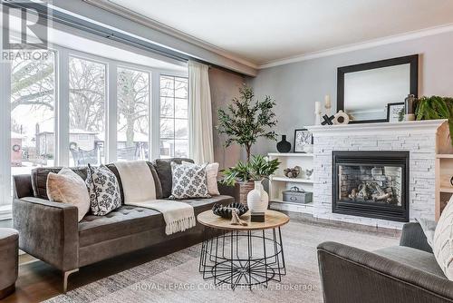 25 Rowatson Road, Toronto, ON - Indoor Photo Showing Living Room With Fireplace