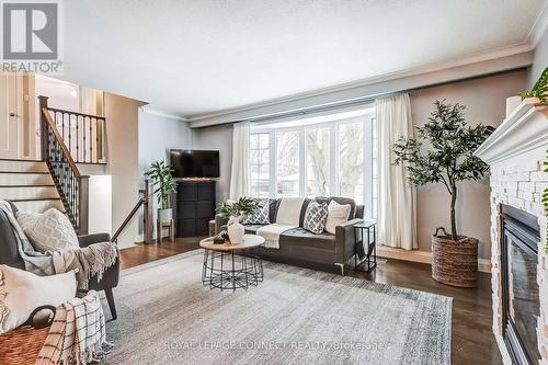 25 Rowatson Road, Toronto, ON - Indoor Photo Showing Living Room With Fireplace