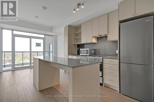620 - 50 George Butchart Drive, Toronto, ON - Indoor Photo Showing Kitchen