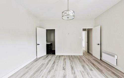 Primary bedroom - 1385 Ch. Des Hauteurs, Sainte-Adèle, QC - Indoor Photo Showing Other Room