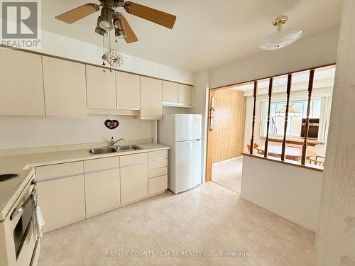 25 - 433 May Street, Brock, ON - Indoor Photo Showing Kitchen With Double Sink