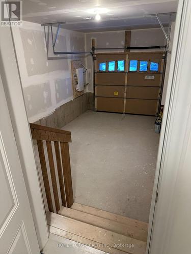 8 - 68 First Street, Orangeville, ON - Indoor Photo Showing Garage