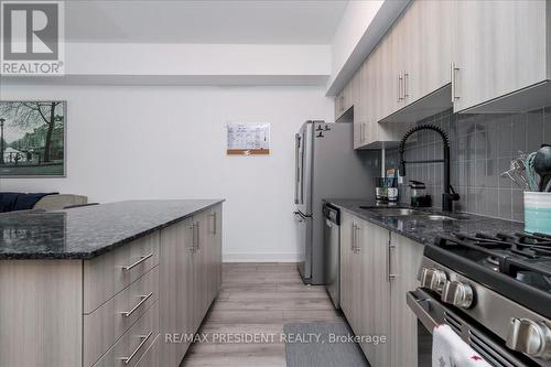 106 - 10 Culinary Lane, Barrie, ON - Indoor Photo Showing Kitchen With Upgraded Kitchen