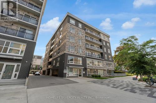 A405 - 275 Larch Street, Waterloo, ON - Outdoor With Balcony With Facade