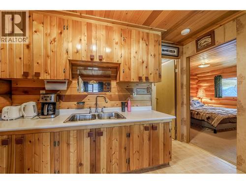 7561 Mccarthy Road, Bridge Lake, BC - Indoor Photo Showing Kitchen With Double Sink