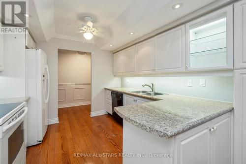404 - 610 Bullock Drive, Markham, ON - Indoor Photo Showing Kitchen With Double Sink