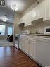 423 680 7Th Avenue E, Melville, SK  - Indoor Photo Showing Kitchen With Double Sink 