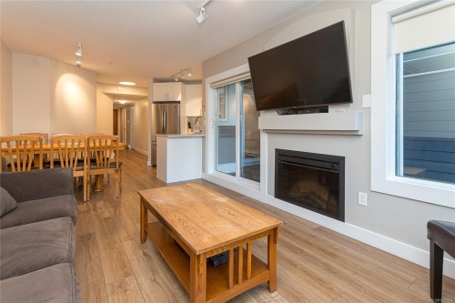 711-1600 Stroulger Rd, Nanoose Bay, BC - Indoor Photo Showing Living Room With Fireplace