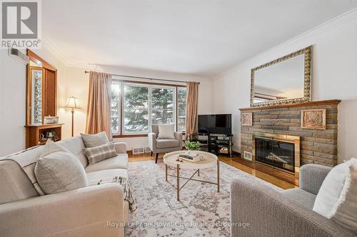107 Westmount Road, Guelph (Exhibition Park), ON - Indoor Photo Showing Living Room With Fireplace