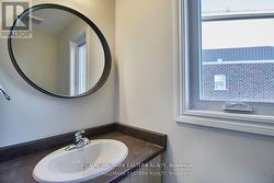 powder room, designer mirrors in all baths - 