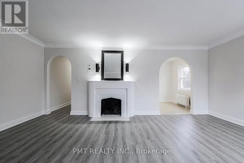 5 - 8 Wellington Street W, Brampton, ON - Indoor Photo Showing Living Room With Fireplace