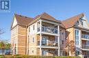 301 - 132 Aspen Springs Drive, Clarington (Bowmanville), ON  - Outdoor With Balcony With Facade 