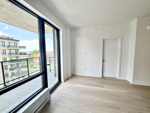 Salon - 609-4400 Boul. St-Jean, Dollard-Des-Ormeaux, QC -  Photo Showing Other Room