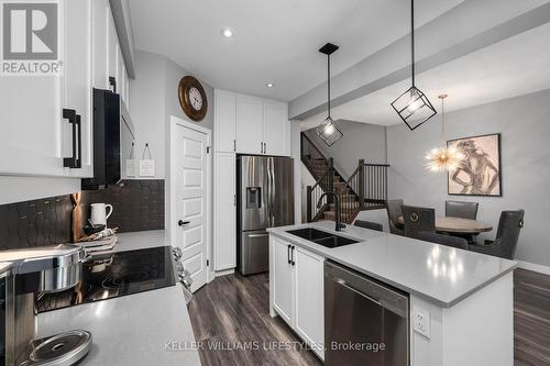 252 Doan Drive, Middlesex Centre, ON - Indoor Photo Showing Kitchen With Double Sink With Upgraded Kitchen
