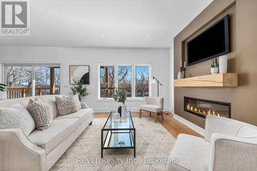 Living room with fireplace - 752 Gorham Road, Fort Erie (Ridgeway), ON - Indoor Photo Showing Living Room With Fireplace