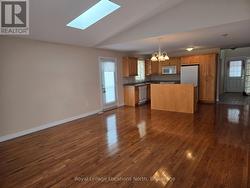 Gleaming hardwood floors and bonus side door! - 