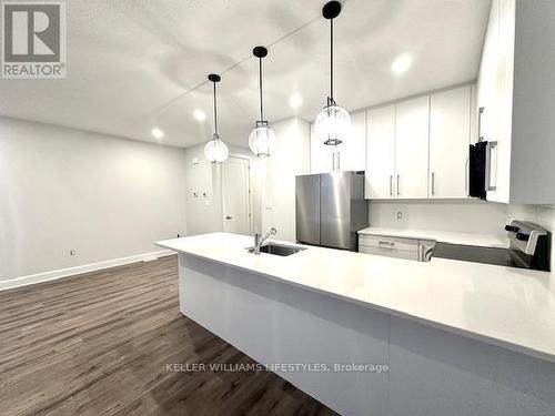 233 - 175 Doan Drive, Middlesex Centre, ON - Indoor Photo Showing Kitchen