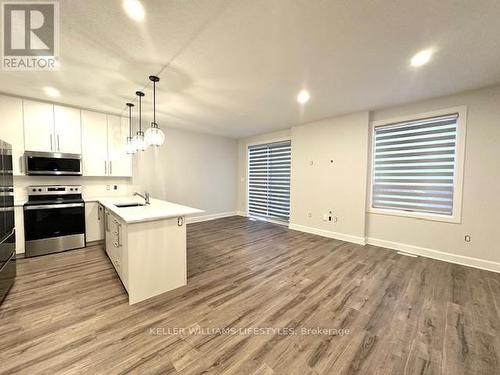 233 - 175 Doan Drive, Middlesex Centre, ON - Indoor Photo Showing Kitchen
